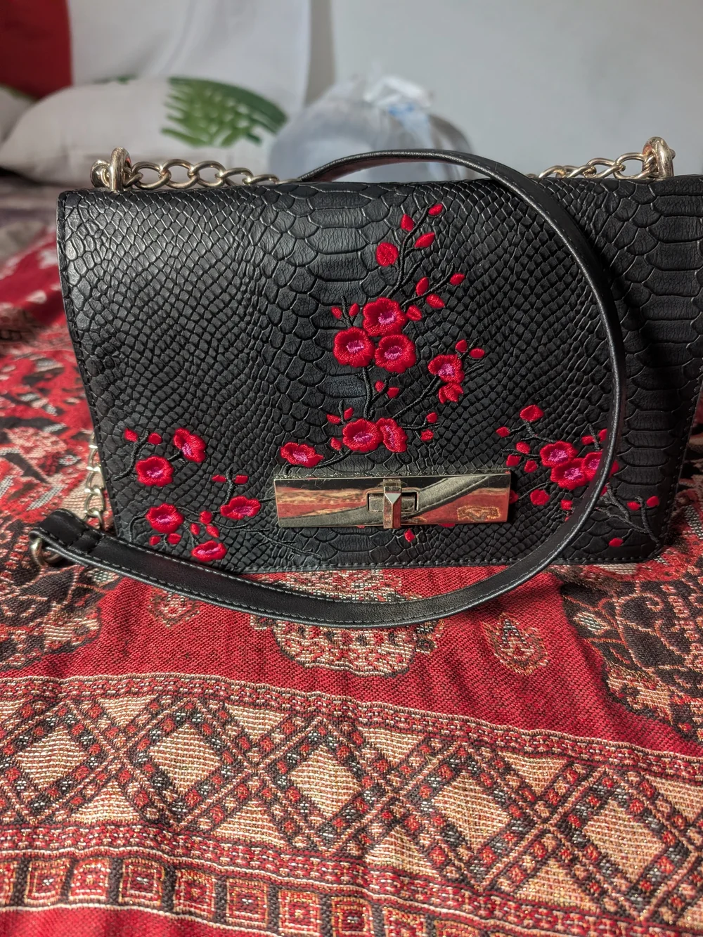 Black Embossed Leather Crossbody Bag with Red Floral Embroidery